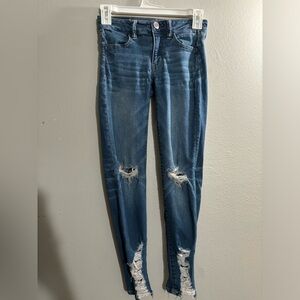 AE next level stretch oo distressed women’s jegging, medium wash